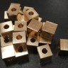 Оригинальный заказ клиента: кубики из бронзы.